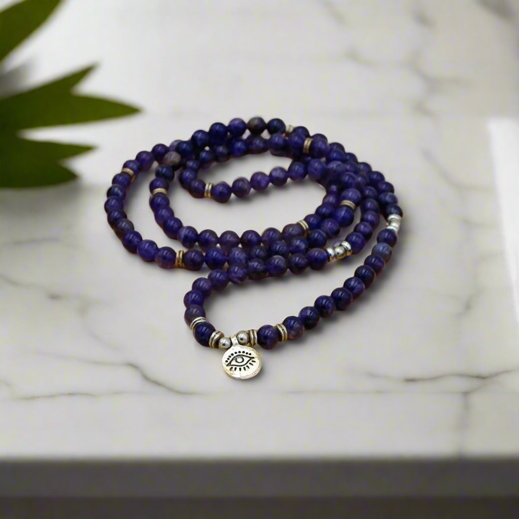 Peaceful Amethyst Third Eye Mala Bead Necklace for meditation, chakra healing, and spiritual balance.