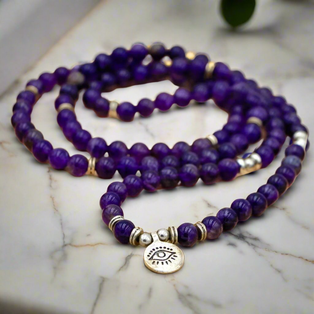 Peaceful Amethyst Third Eye Mala Bead Necklace for meditation, chakra healing, and spiritual balance.