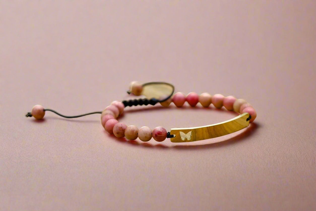 Hope Butterfly Bracelet with rose quartz, a symbol of transformation and crystals for anxiety.