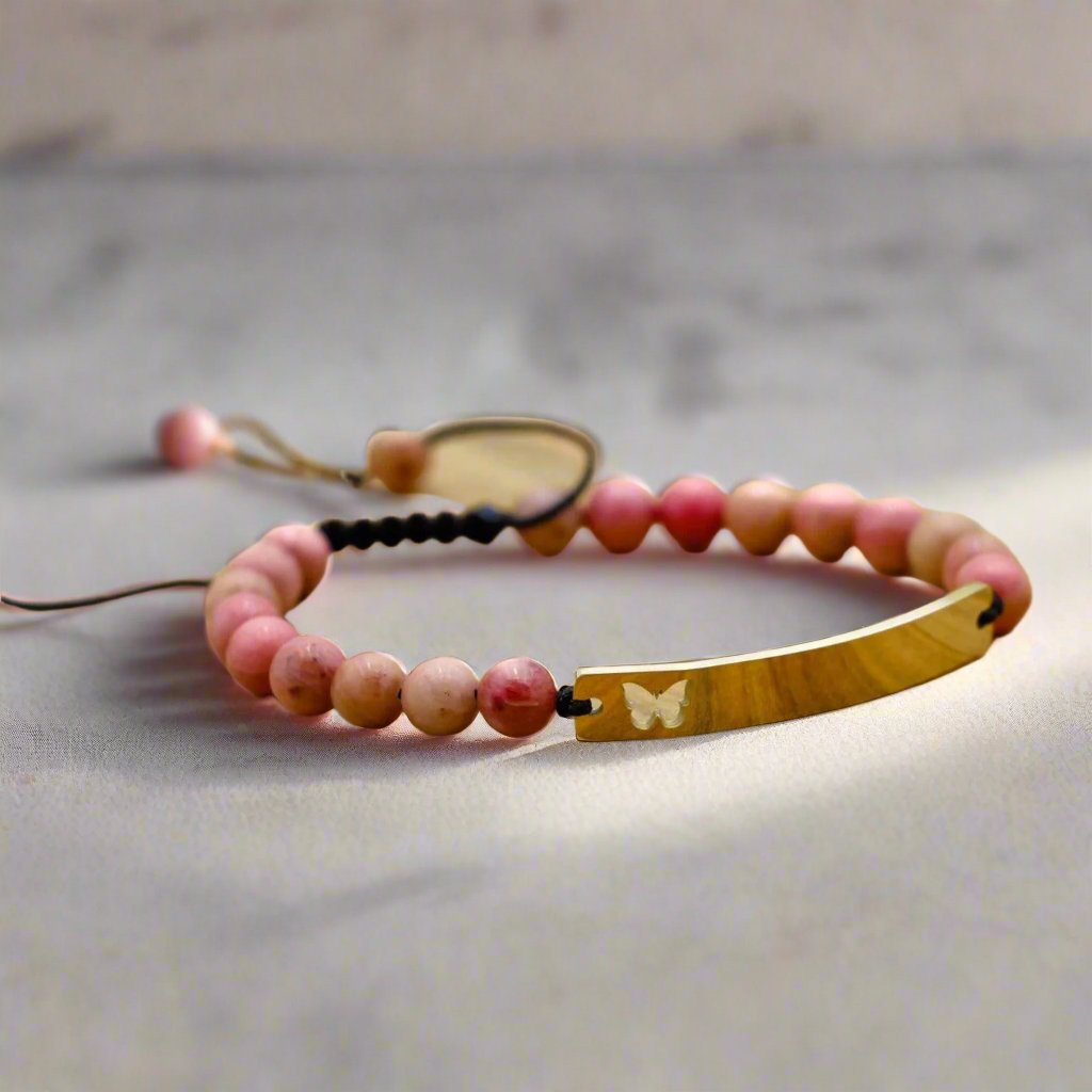 Hope Butterfly Bracelet with rose quartz, a symbol of transformation and crystals for anxiety.