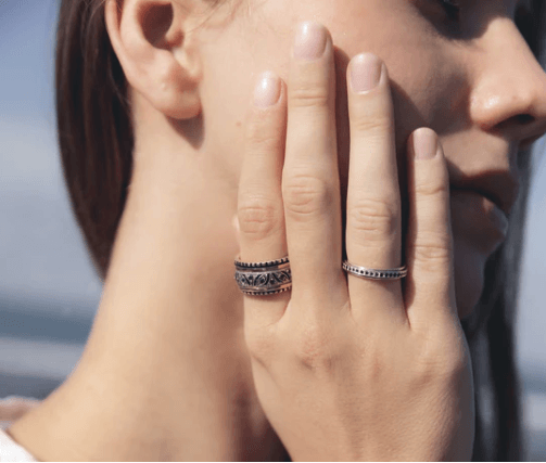 Sterling Silver Spinner Ring with Black CZ Spinning Band – A versatile fidget ring designed for mindfulness and relaxation, featuring a spinning band and black cubic zirconia.