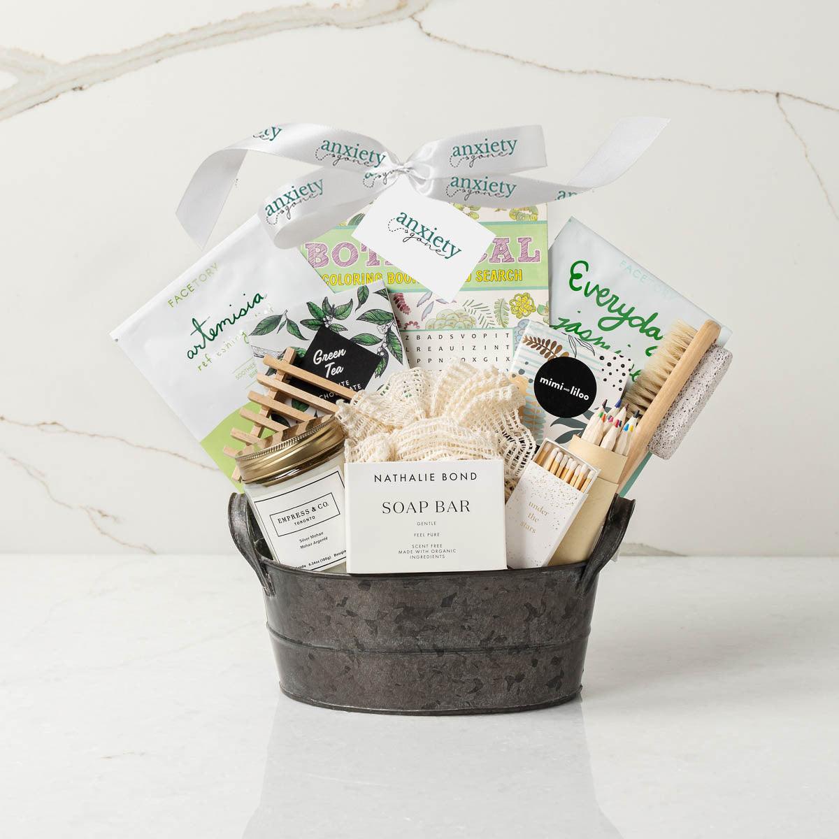 Spa Day Gift Basket featuring luxurious self-care items like a candle, face mask, foot brush, tea, and chocolate—perfect for self-care gifts, thank you gift baskets, and wellness gift baskets.