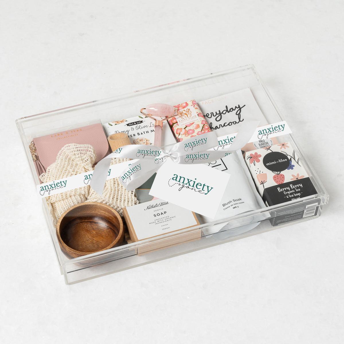 Luxe Serenity Gift Box featuring premium self-care items, bath milk, jade roller, tea, chocolate, and more—perfect for self-care gifts, get well soon gifts, and thank you gift baskets.