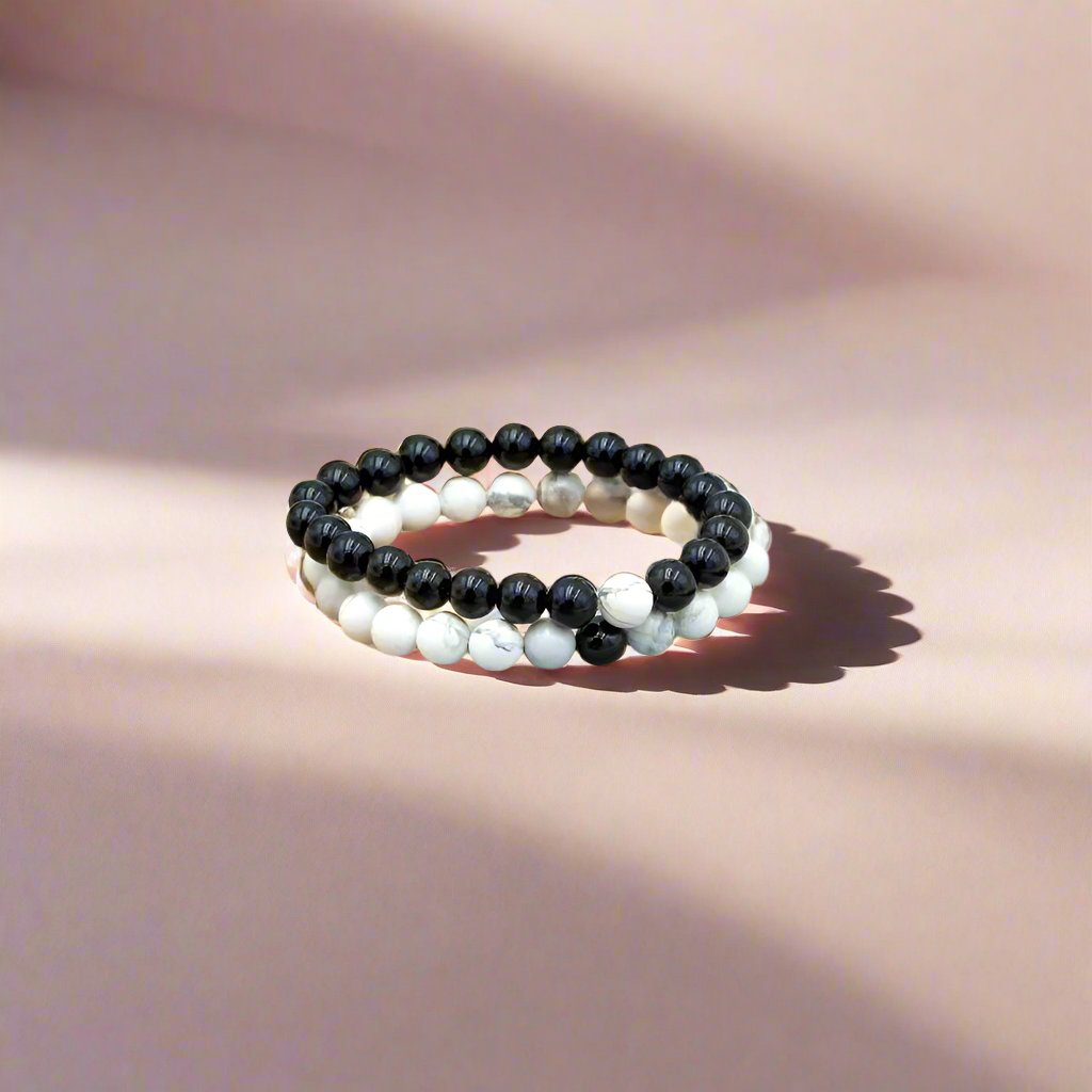 Yin and Yang Gemstone Friendship Bracelet Set with white howlite and black agate stones for balance, connection, and emotional growth.