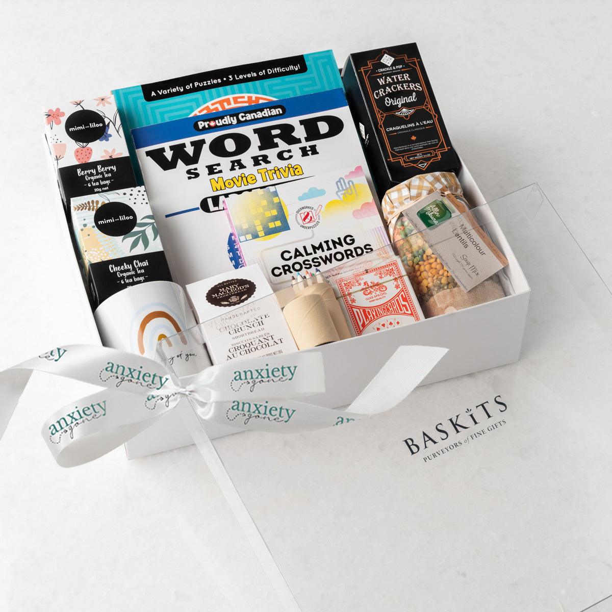 Thinking of You Gift Box – A thoughtful get well soon gifts for men featuring tea, puzzles, cookies, playing cards, and more for mental health and relaxation.