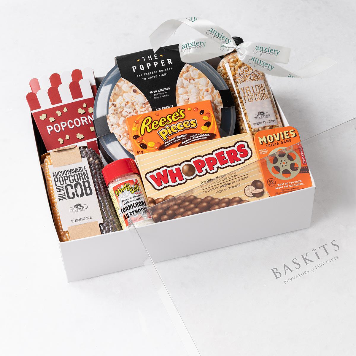 Movie Night Gift Box – A self-care gift box featuring popcorn, candy, a trivia game, and more for the ultimate movie night experience.