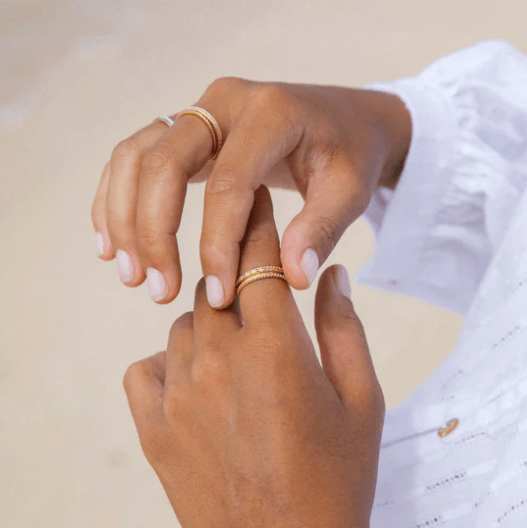 14KT Yellow Gold Fidget Ring with bubble edges and twisting band, displayed with complimentary Meditation Rings Tin and Travel Pouch