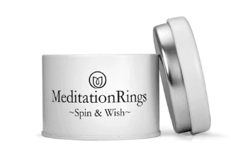 Sterling Silver Spinning Ring with scalloped edges and two silver spinning bands, displayed with complimentary MeditationRings Tin and Travel Pouch