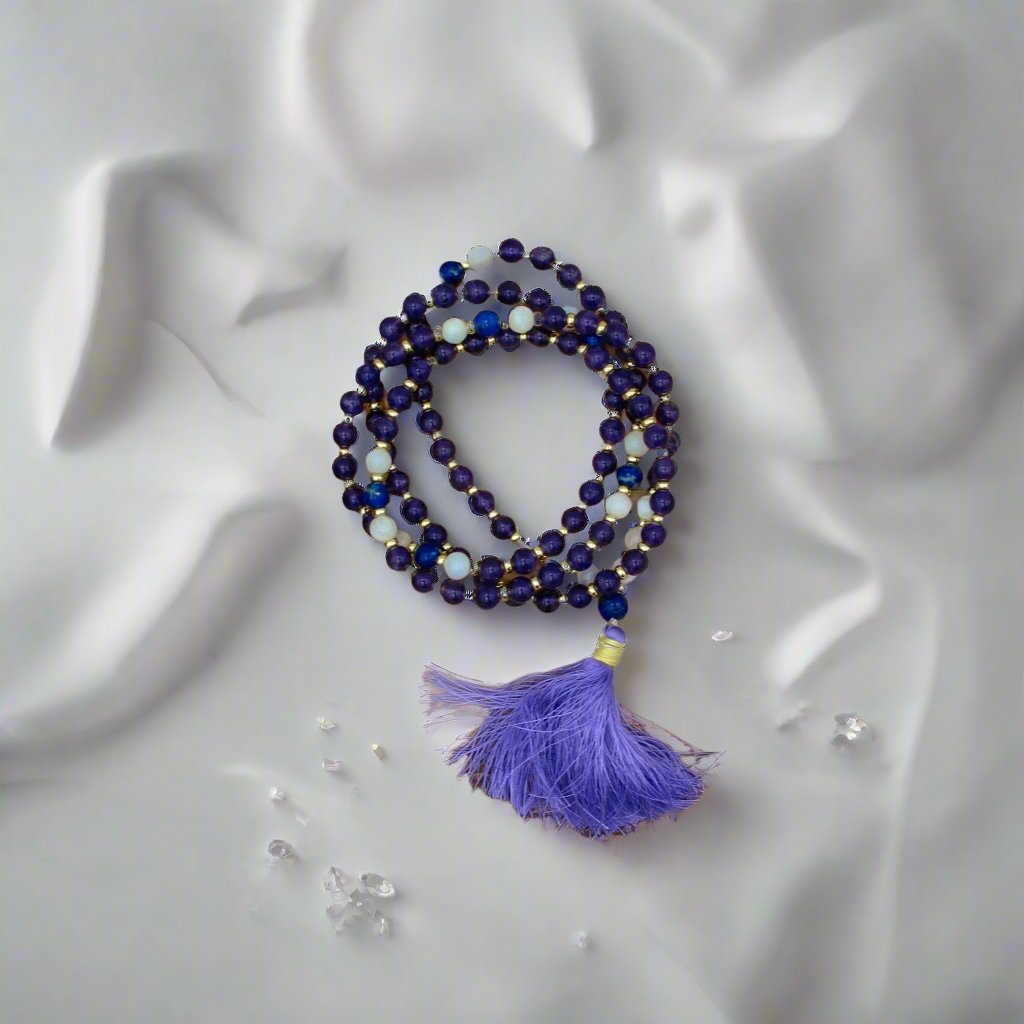 Inner Guidance Amethyst Mala Necklace with 108 beads made from amethyst, moonstone, and lapis lazuli for spiritual awakening and anxiety relief.