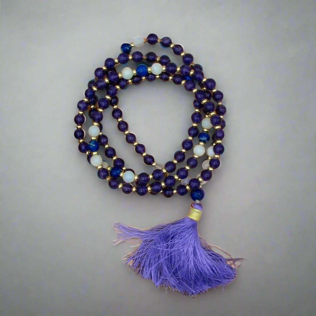 Inner Guidance Amethyst Mala Necklace with 108 beads made from amethyst, moonstone, and lapis lazuli for spiritual awakening and anxiety relief.