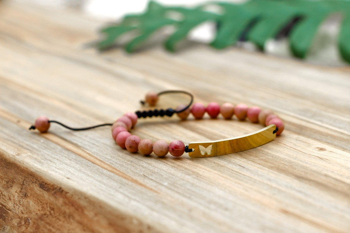 Hope Butterfly Bracelet with rose quartz, a symbol of transformation and crystals for anxiety.