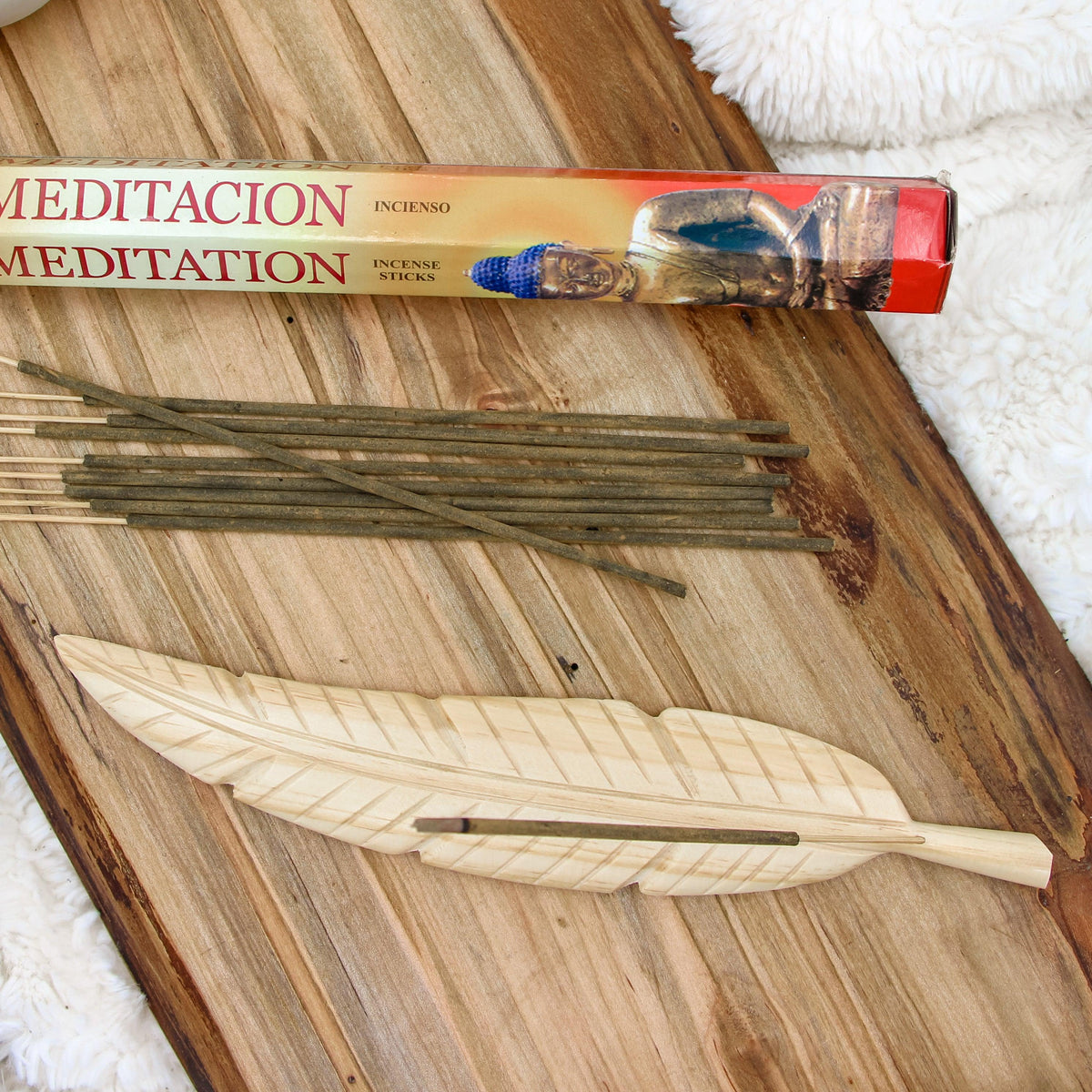 Feather Wood Incense Holder for incense sticks, symbolizing strength, freedom, and anxiety relief.