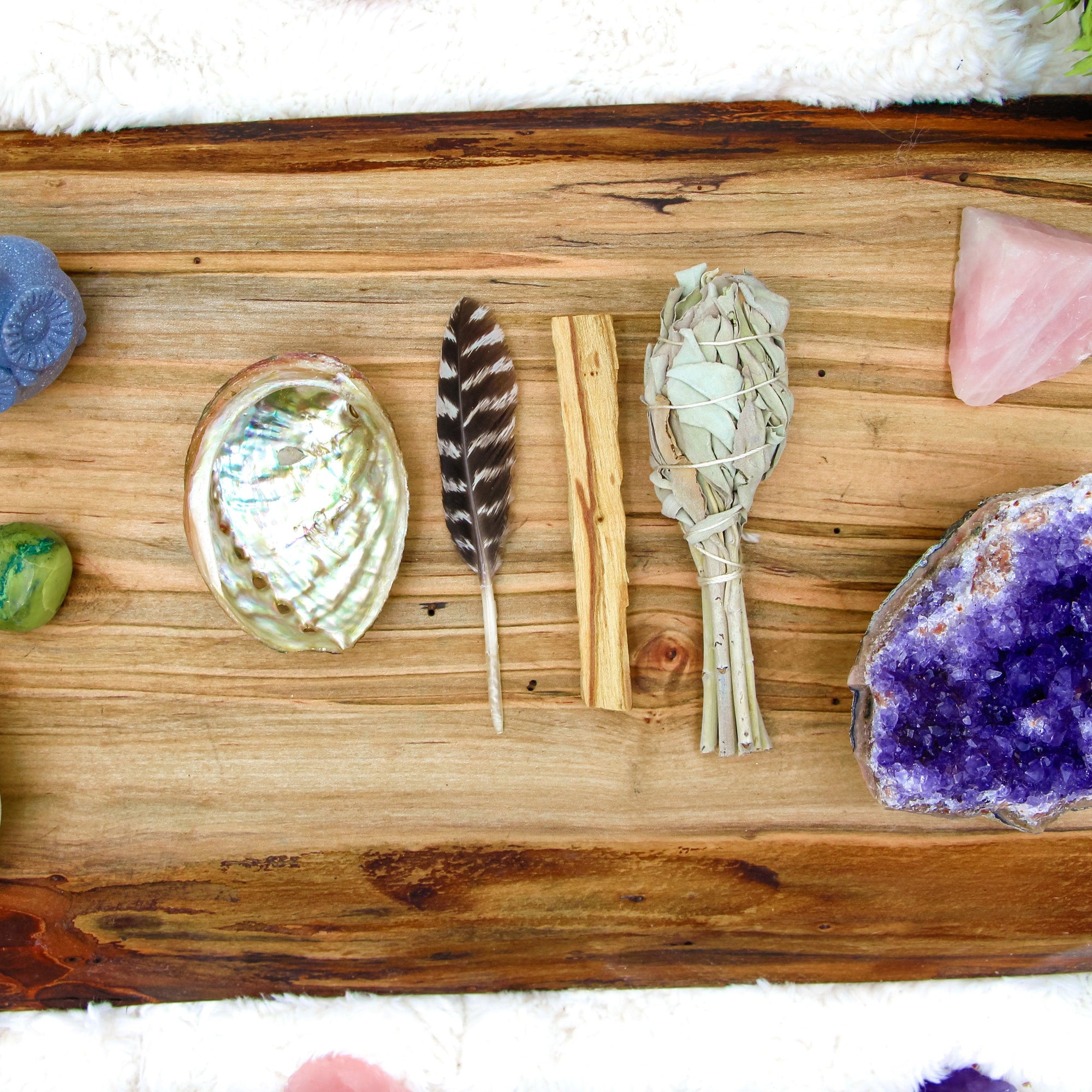 Beginner's Mini Smudging Kit with abalone shell, smudge stick, palo santo, and feather for energy cleansing, spiritual healing, and anxiety relief