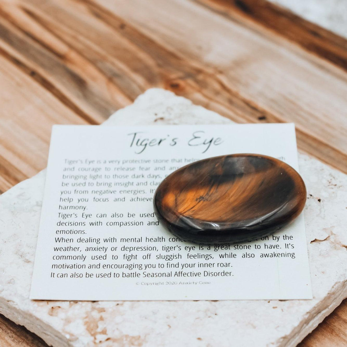 Tiger&#39;s Eye Worry Stone for anxiety relief and releasing fear, making it an excellent fidget toy and crystal for anixety.